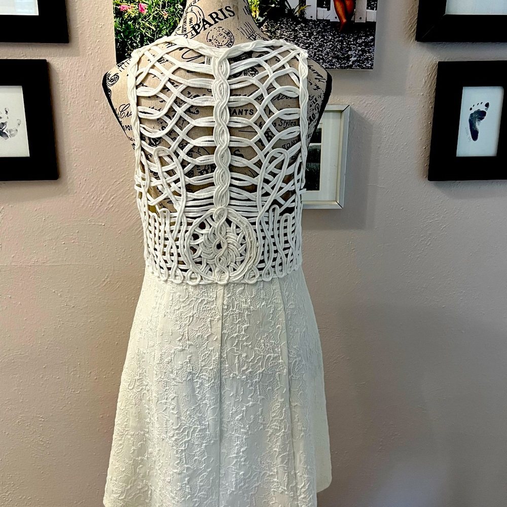 Stunning crochet back and embossed vanilla colored dress